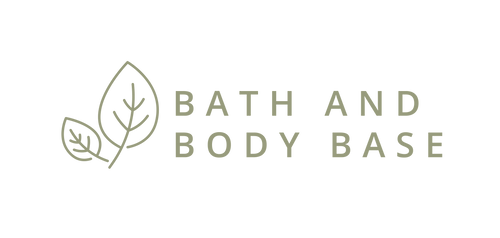 Two leaves next to text in capital letters that says Bath and Body Base