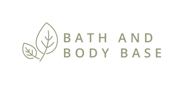 Two leaves next to text in capital letters that says Bath and Body Base